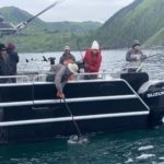 Guests fishing on boat at Kodiak Raspberry Island Lodge
